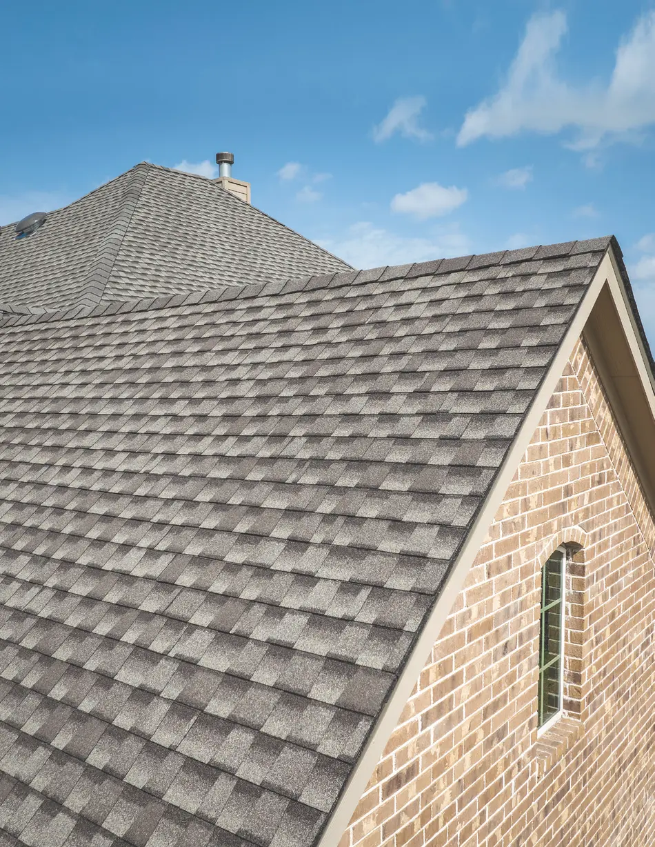 Ultra-dimensional GAF Timberline UHDZ shingle roof against blue sky
