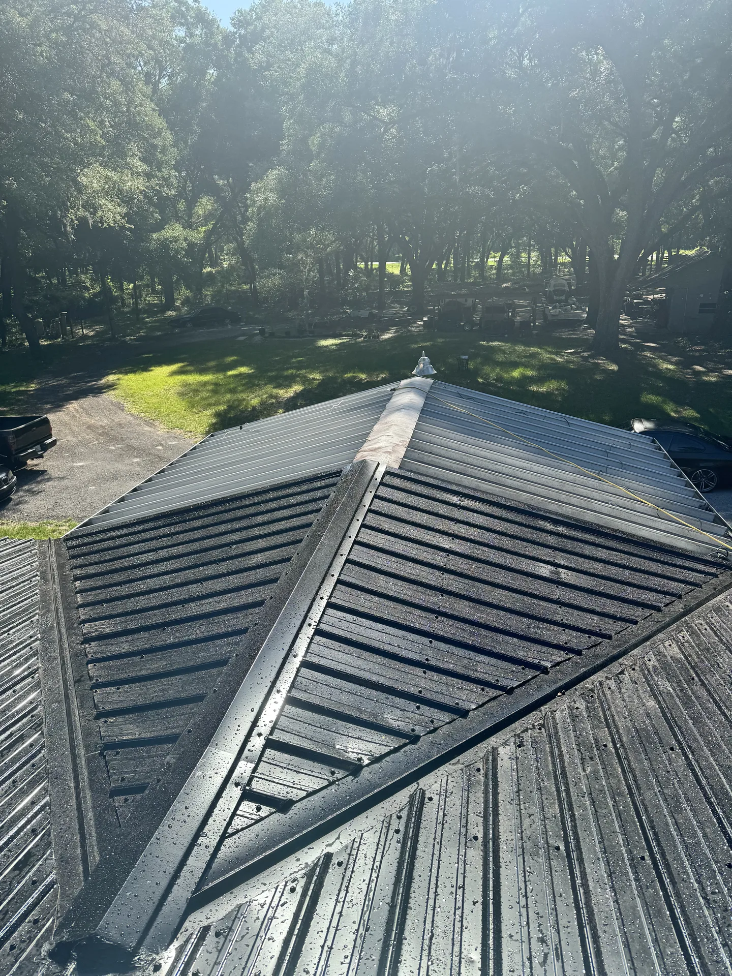 Navy standing-seam metal roof installation Central Florida